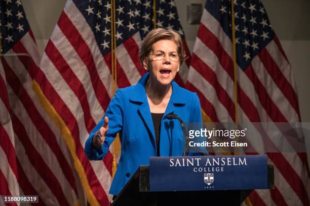 Democratic presidential candidate Sen. Elizabeth Warren gestures as she delivers an economic policy speech on December 12, 2019 in Manchester, New...