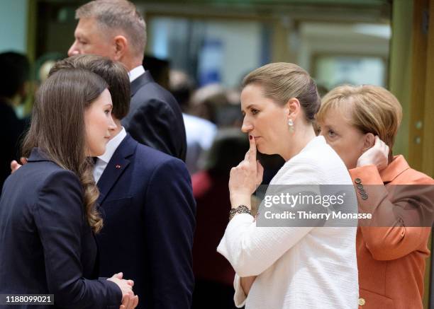 Finnish Prime Minister Sanna Mirella Marin is talking with the Danish Prime Minister Mette Frederiksen and the German Chancellor Angela Merkel on the...