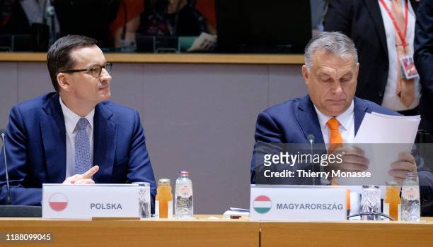 Polish Prime Minister Mateusz Morawiecki and the Hungarian Prime Minister Viktor Mihaly Orban attend the first of a two-day summit of European Union...