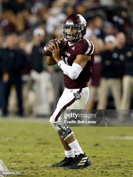 Kellen Mond of the Texas A&M Aggies looks for a receiver during the second quarter against the South Carolina Gamecocks at Kyle Field on November 16,...