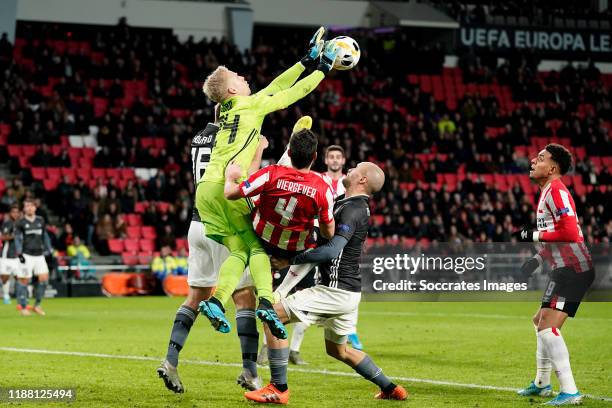 Arild Ostbo of Rosenborg BK, Nick Viergever of PSV, Donyell Malen of PSV during the UEFA Europa League match between PSV v Rosenborg BK at the...