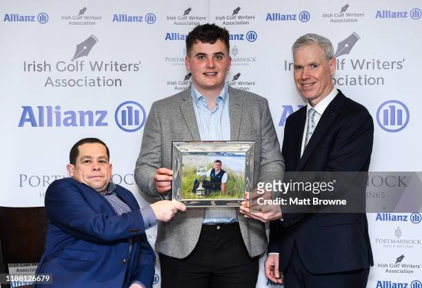 Dublin , Ireland - 12 December 2019; James Sugrue is Presented with the Mens Amateur of the Year Award for 2019 by Paul Kelly, Chairman of the Irish...