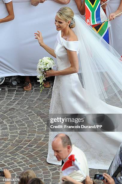 Prince Albert II of Monaco and Princess Charlene of Monaco make their journey to Sainte Devote church after their religious wedding ceremony at the...