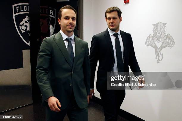 Denis Malgin and Evgeni Dadonov of the Florida Panthers arrive for tonights game against the New York Islanders at the BB&T Center on December 12,...