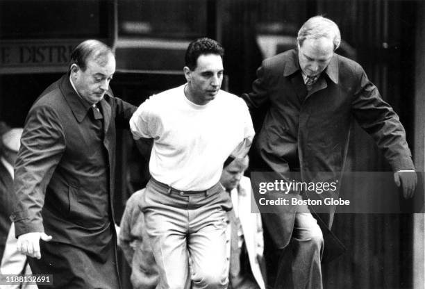 Reputed Mafia capo regime Vincent M. "The Animal" Ferrara is led into court in Boston on Nov. 15, 1989. The government is seeking grand jury...