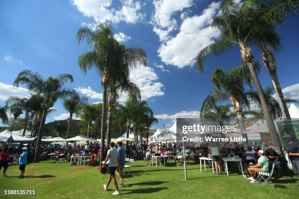 Spectators are pictured in the hospitality village during the third round of the Nedbank Golf Challenge hosted by Gary Player at the Gary Player CC...