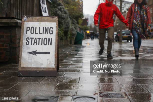 People come to vote in UK General Election to a polling station in London, United Kingdom on December 12, 2019.