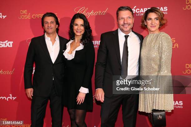 Mariella Ahrens and her boyfriend Michael Raumann, Hardy Krueger jr. And his wife Alice Krueger during the 25th annual Jose Carreras Gala on December...