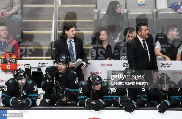 Interim head coach Bob Boughner and assistant coach Mike Ricci of the San Jose Sharks coach in their first game against the New York Rangers at SAP...