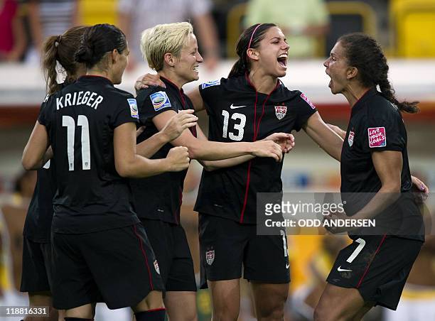 S midfielder Shannon Boxx celebrates scoring her penalty with teammates during the quarter-final match of the FIFA women's football World Cup Brazil...