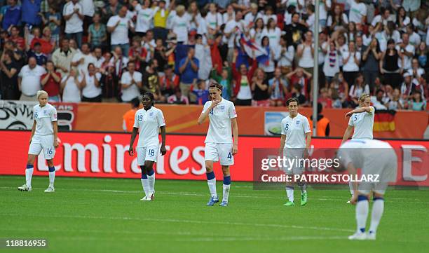 England's midfielder Stephanie Houghton, England's midfielder Anita Asante, England's midfielder Jill Scott, England's midfielder Fara Williams and...