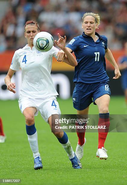 England's midfielder Jill Scott and France's defender Laure Lepailleur vie for the ball during the quarter-final match of the FIFA women's football...
