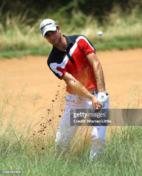 Guido Migliozzi plays out the rough on the 14th hole during the fourth round of the Nedbank Golf Challenge hosted by Gary Player at the Gary Player...