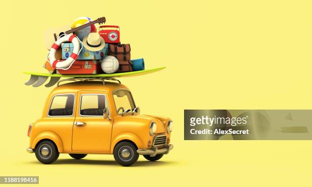 yellow car with luggage on the roof ready for summer vacation - large group of objects sport stock pictures, royalty-free photos & images