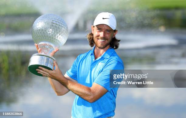 Tommy Fleetwood poses for a photo with the Nedbank Golf Challenge Trophy after victory during the fourth round of the Nedbank Golf Challenge hosted...