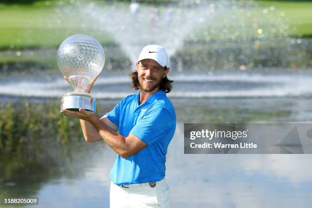 Tommy Fleetwood poses for a photo with the Nedbank Golf Challenge Trophy after victory during the fourth round of the Nedbank Golf Challenge hosted...