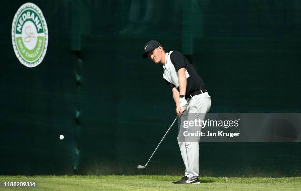 Marcus Kinhult plays his third shot on the 18th hole during the fourth round of the Nedbank Golf Challenge hosted by Gary Player at the Gary Player...