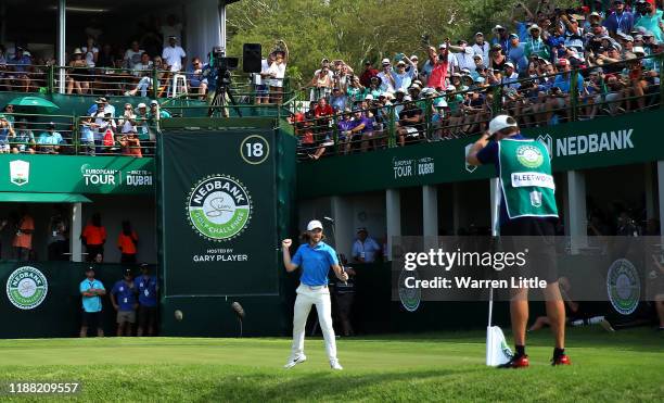 Tommy Fleetwood od England celebrates beating Marcus Kinhult of Sweden in the first extra hole play-off during the final round of the Nedbank Golf...