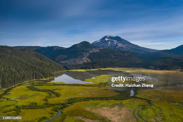 saturated color lake near mt. bachelor oregon cascade range - mt bachelor stock pictures, royalty-free photos & images