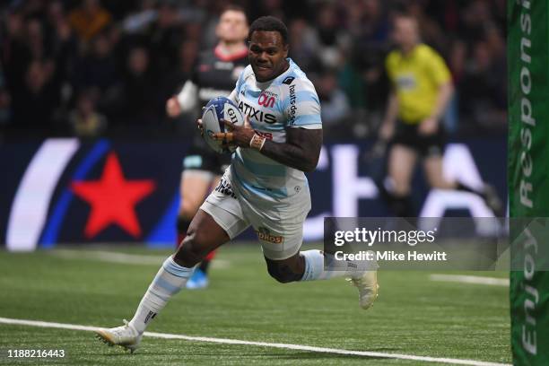 Virimi Vakatawa of Racing 92 crosses for the first try of the match during the Heineken Champions Cup Round 1 match between Racing 92 and Saracens at...