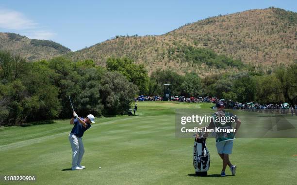 Louis Oosthuizen of South Africa plays his second shot to the 6th hole during the final round of the Nedbank Golf Challenge hosted by Gary Player at...