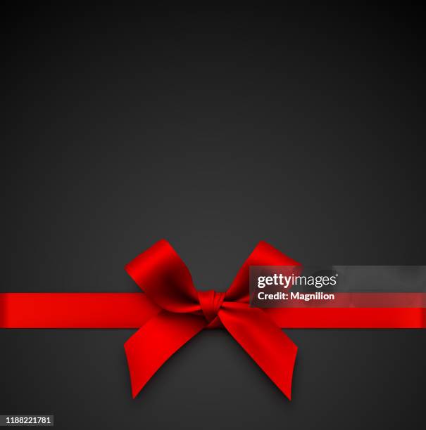 illustrazioni stock, clip art, cartoni animati e icone di tendenza di fiocco regalo rosso con nastro su sfondo nero - christmas ribbon