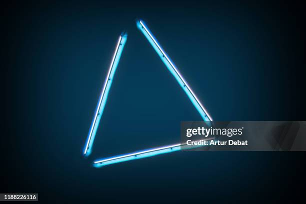 creative neon lights with triangle shape. - business dunkler hintergrund studioaufnahme stock-fotos und bilder