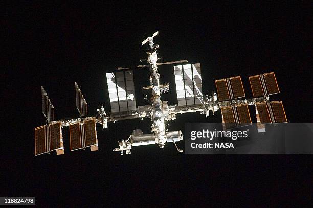 In this handout image provided by the National Aeronautics and Space Administration , the International Space Station photographed by a crewmember...