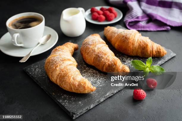 croissants, coffee and berries - dark bread stock pictures, royalty-free photos & images