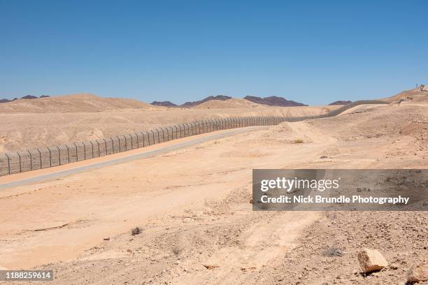 israel egypt border fence, israel. - negev stock pictures, royalty-free photos & images