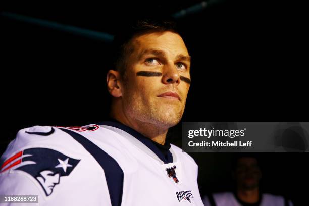 Tom Brady of the New England Patriots walks to the field before the game against the Philadelphia Eagles at Lincoln Financial Field on November 17,...