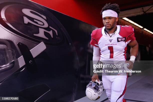 Quarterback Kyler Murray of the Arizona Cardinals runs onto the field before the NFL game against the San Francisco 49ers at Levi's Stadium on...