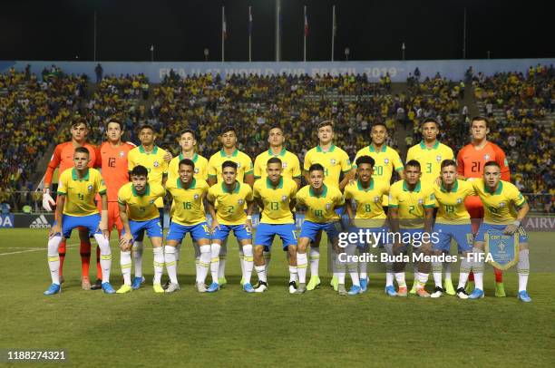 The Brazil side pose for a team picture during the Final of the FIFA U-17 World Cup Brazil 2019 between Mexico and Brazil at the Estadio Bezerrão on...