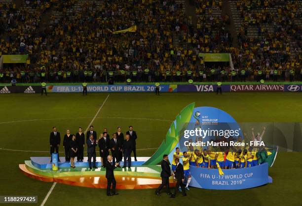 Henri of Brazil lifts the World Cup Trophy during the Final of the FIFA U-17 World Cup Brazil 2019 between Mexico and Brazil at the Estadio Bezerrão...