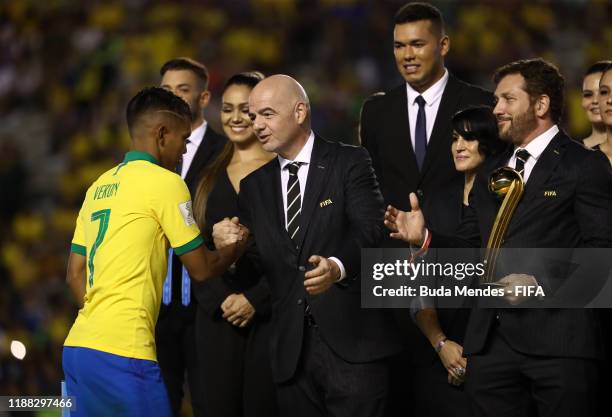 Veron of Brazil is presented with the Golden Ball award by Gianni Infantino, President of FIFA during the Final of the FIFA U-17 World Cup Brazil...