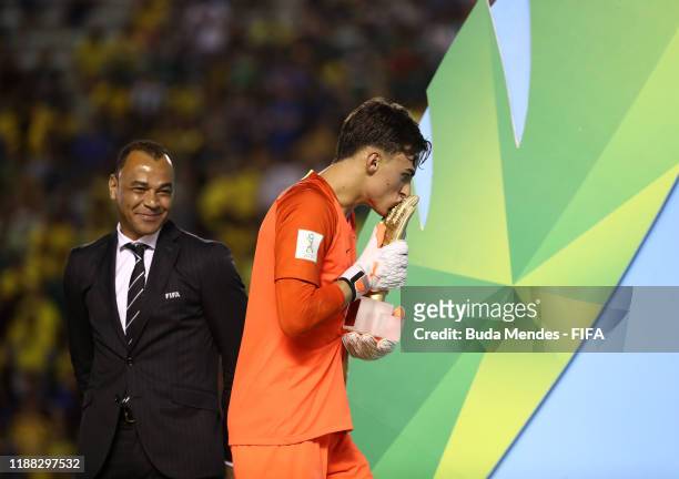 Matheus Donelli of Brazil celebrates after winning the Golden Glove award during the Final of the FIFA U-17 World Cup Brazil 2019 between Mexico and...