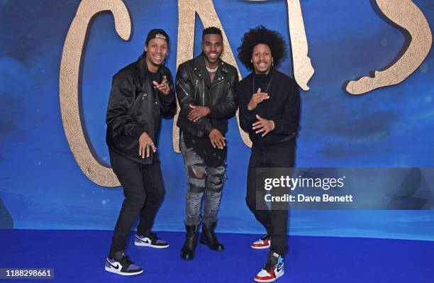 Larry Bourgeois of Les Twins, Jason Derulo and Laurent Bourgeois of Les Twins attend a photocall for "Cats" at the Corinthia Hotel London on December...