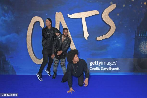 Larry Bourgeois of Les Twins, Jason Derulo and Laurent Bourgeois of Les Twins attend a photocall for "Cats" at the Corinthia Hotel London on December...