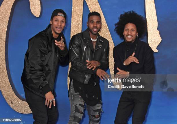 Larry Bourgeois of Les Twins, Jason Derulo and Laurent Bourgeois of Les Twins attend a photocall for "Cats" at the Corinthia Hotel London on December...