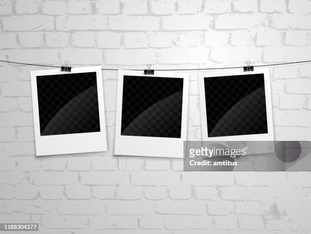 polaroid wall bg - hanging picture frame stock illustrations