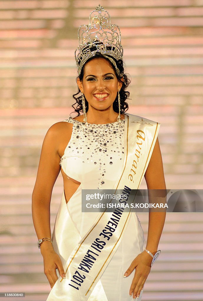 Sri Lankan beauty queen Stephanie Siriwardena smiles as she is