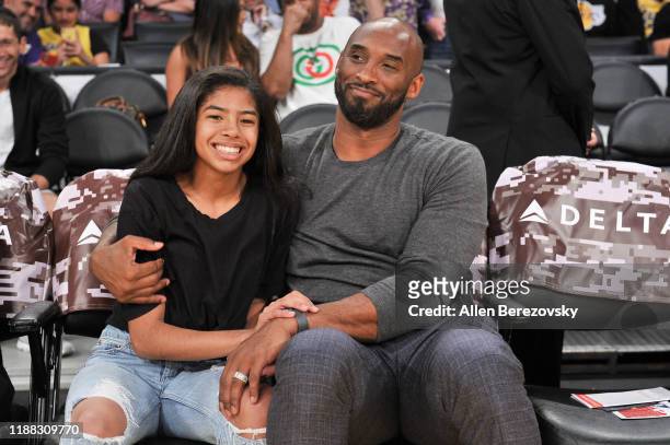 Kobe Bryant and his daughter Gianna Bryant attend a basketball game between the Los Angeles Lakers and the Atlanta Hawks at Staples Center on...