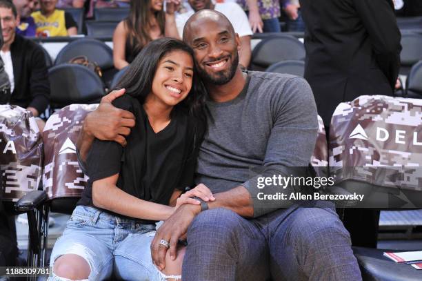 Kobe Bryant and his daughter Gianna Bryant attend a basketball game between the Los Angeles Lakers and the Atlanta Hawks at Staples Center on...