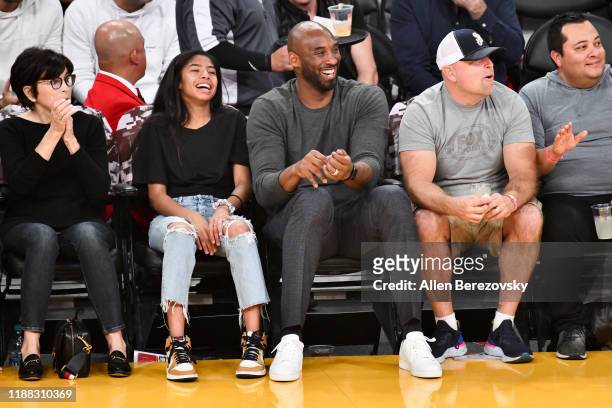 Kobe Bryant and his daughter Gianna Bryant attend a basketball game between the Los Angeles Lakers and the Atlanta Hawks at Staples Center on...