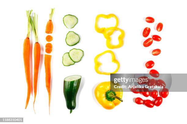 fresh vegetables isolated on white background. carrot, cucumber, pepper and tomato. flat lay. - carrots white background stockfoto's en -beelden