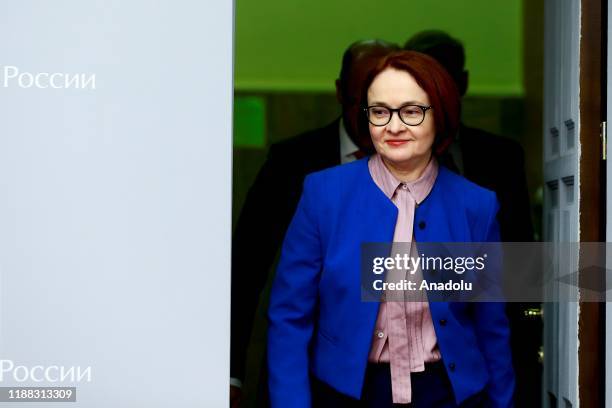 Russian Central Bank Governor Elvira Nabiullina arrives to makes a speech during press conference, after bank's decision to cut interest rates from...