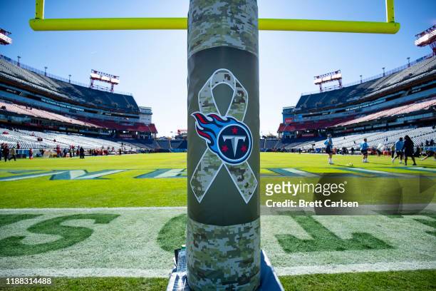 Detail view of Salute to Service ribbon and Tennessee Titans logo on a goal post before the game against the Kansas City Chiefs at Nissan Stadium on...