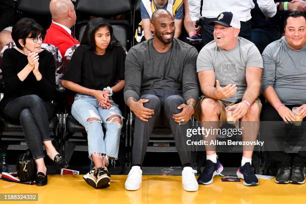 Kobe Bryant and his daughter Gianna Bryant attend a basketball game between the Los Angeles Lakers and the Atlanta Hawks at Staples Center on...