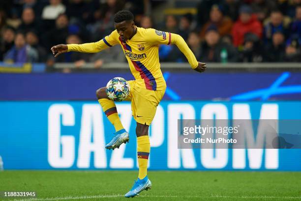 Moussa Wague of Barcelona controls the ball during the UEFA Champions League group F match between Inter and FC Barcelona at Giuseppe Meazza Stadium...