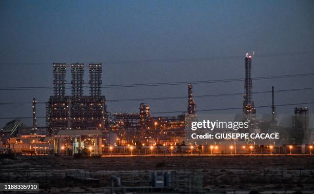 This picture taken on December 11 shows a view of a refinery at the Jubail Industrial City, about 95 kilometres north of Dammam in Saudi Arabia's...